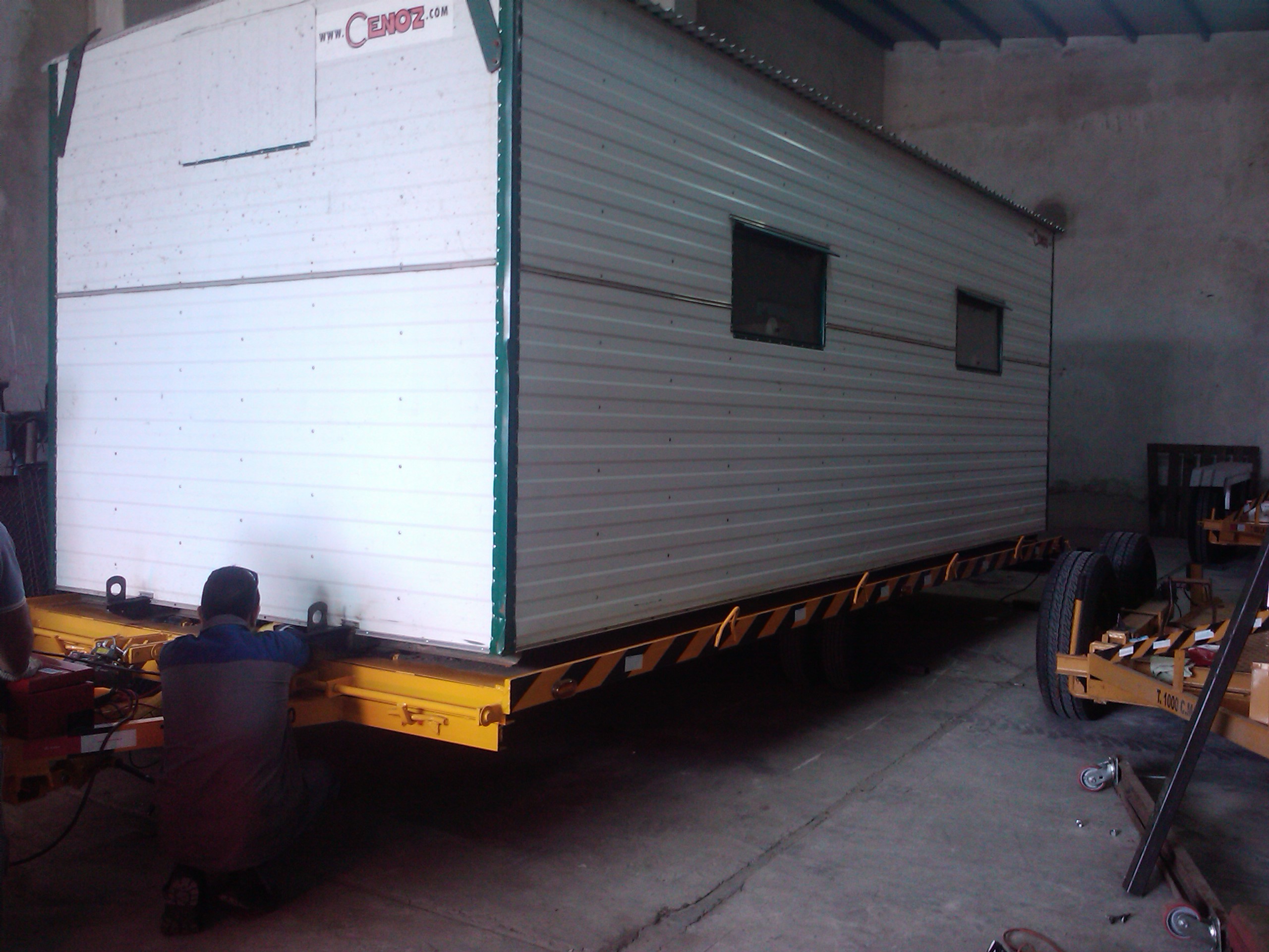 Acoplado camilla autodescargable
